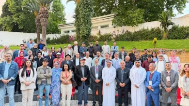 محمد القصير يتوسط الشعراء المشاركين في المهرجان